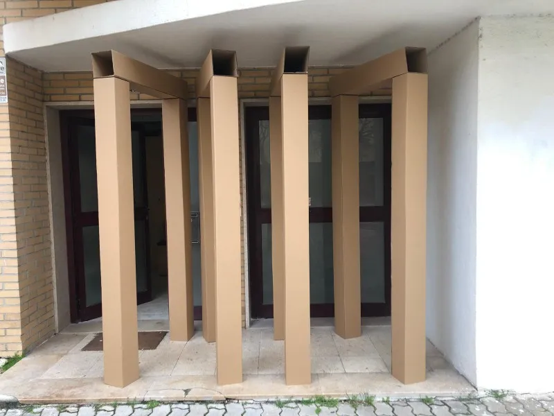 To Be Stoic, 2024. Installation composed of four porticoes, cardboard, 216 × 100 × 16 cm.
